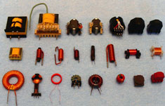 Assortment of transformers and chokes on ferrite core